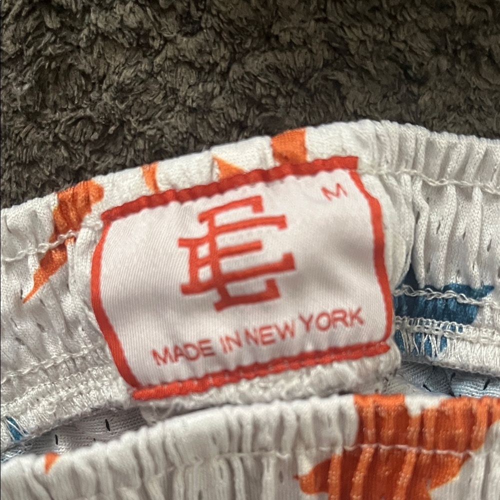 Eric Emanuel White Shorts with Orange and Blue Stars - Picture 5 of 5